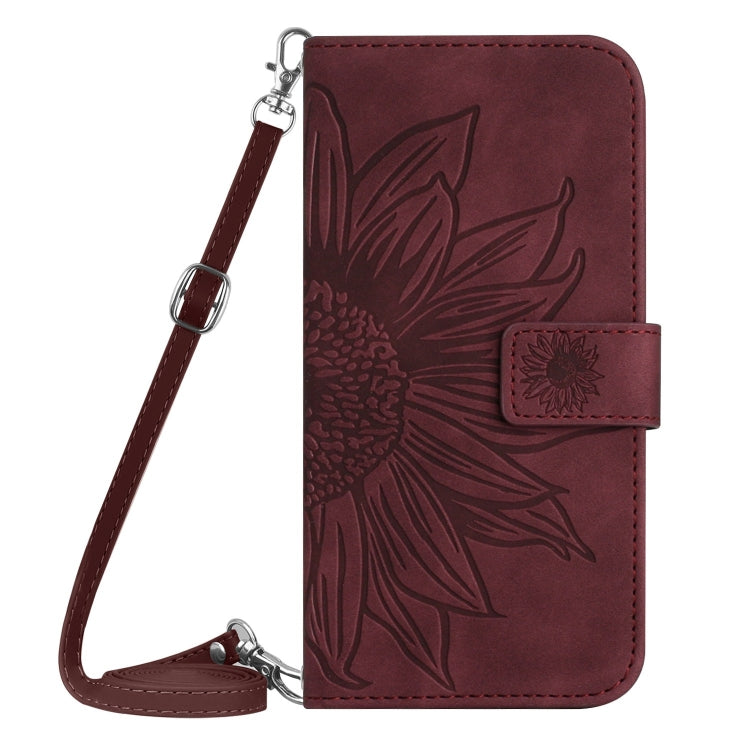 For iPhone 16 Plus Skin Feel Sun Flower Embossed Flip Leather Phone Case with Lanyard(Wine Red) - iPhone 16 Plus Cases by buy2fix | Online Shopping UK | buy2fix