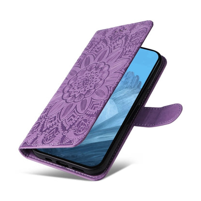 For Google Pixel 9 Embossed Sunflower Leather Phone Case(Purple) - Google Cases by buy2fix | Online Shopping UK | buy2fix